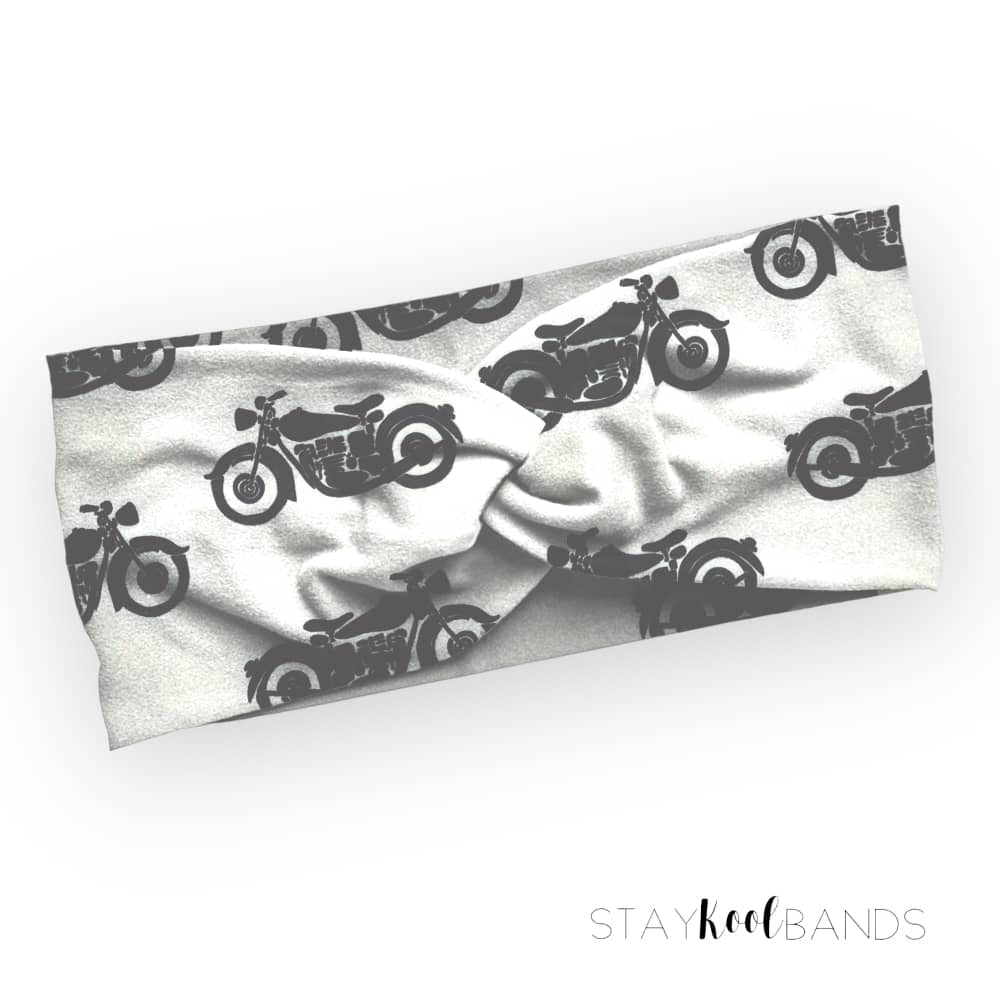 Black motorcycles on a white soft headband
