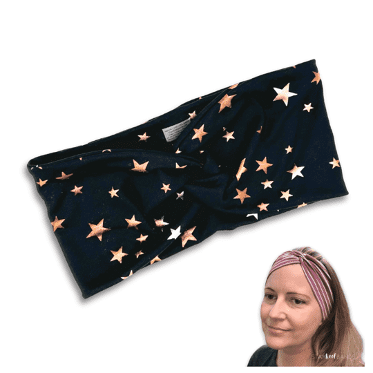 black headband with gold stars front of headband