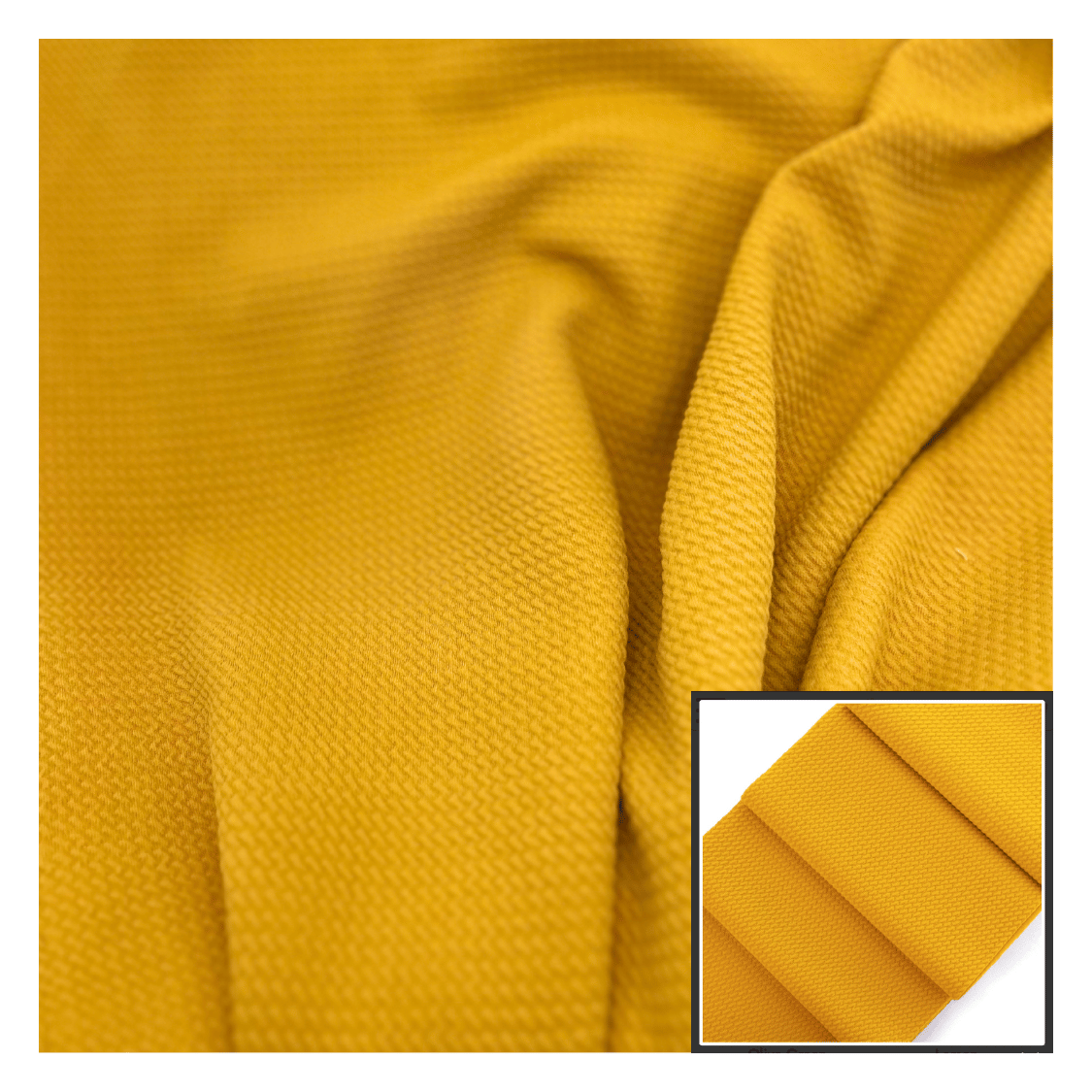 Close-up of yellow fabric with a smaller inset showing texture details.