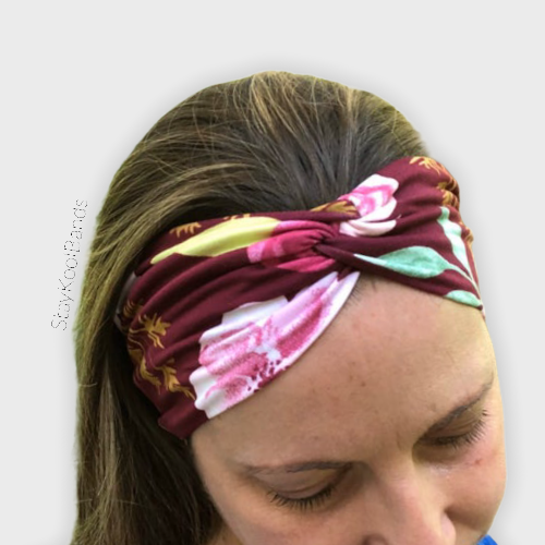 burgundy floral headband on head