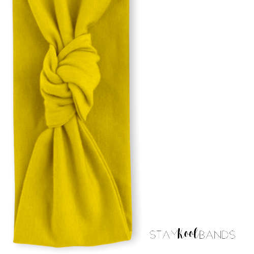 yellow headband with a knot