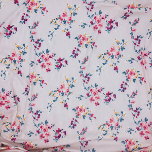 peachy pink soft ribbed fabric with small floral pattern. sewn into hair accessories | Stay Kool Bands
