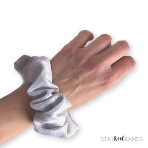 glitter scrunchie on wrist
