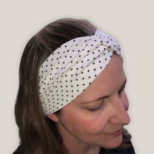 mini polka dots on headband on her